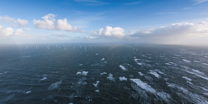 A offshore wind farm with many wind turbines